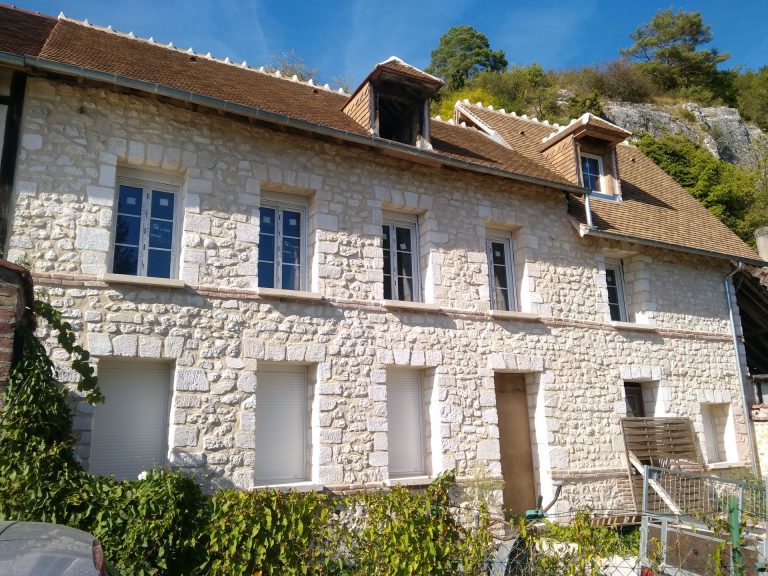 Façade maison en pierre apparente